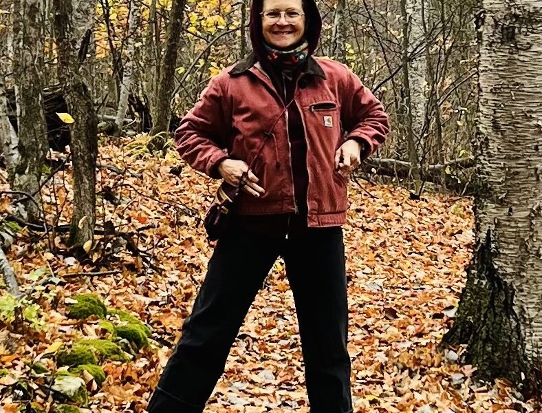 Anna Bierbrauer stands in a forest