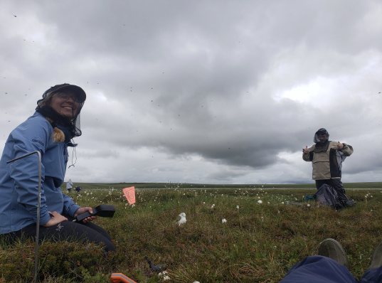 Katie Braun holds a soil moisture probe