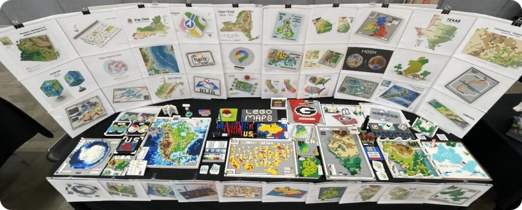 A wide variety of LEGO maps sit on a table