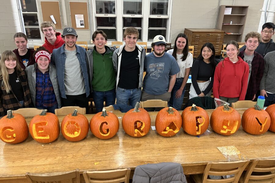Geography undergrads with carved pumpkins