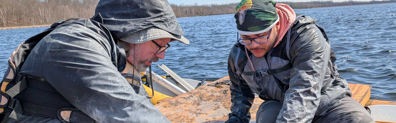 Prof Jack Williams and a geography student prepare for fieldwork on a lake